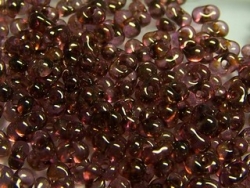 #50.00 - 10 g cz. Farfalle 4x2 mm tr. crystal senegal violett