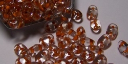 #027 10g SuperDuo-Beads tr. crystal orange lined